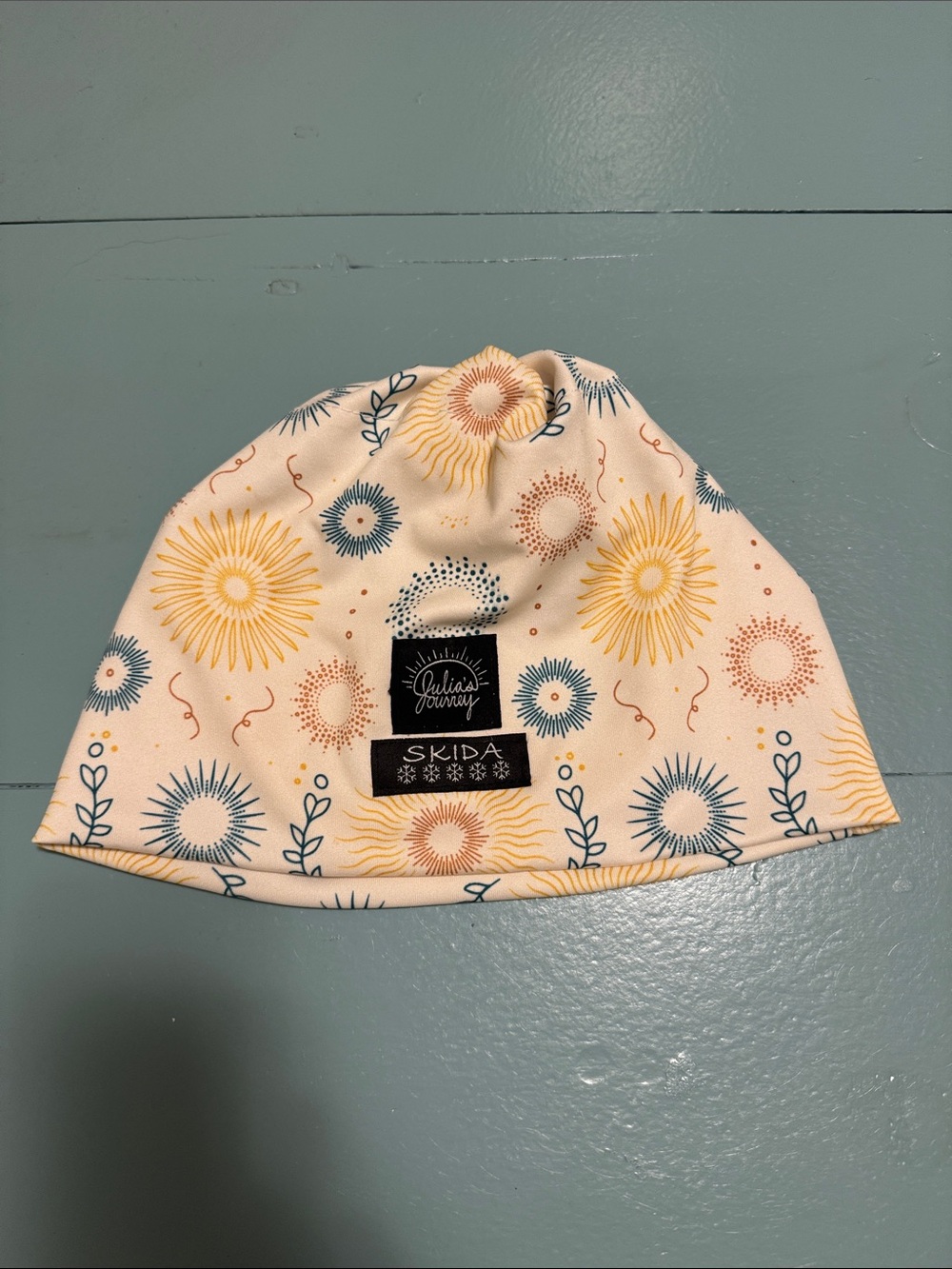 Skida men’s or womens Cream Floral Sunburst Beanie